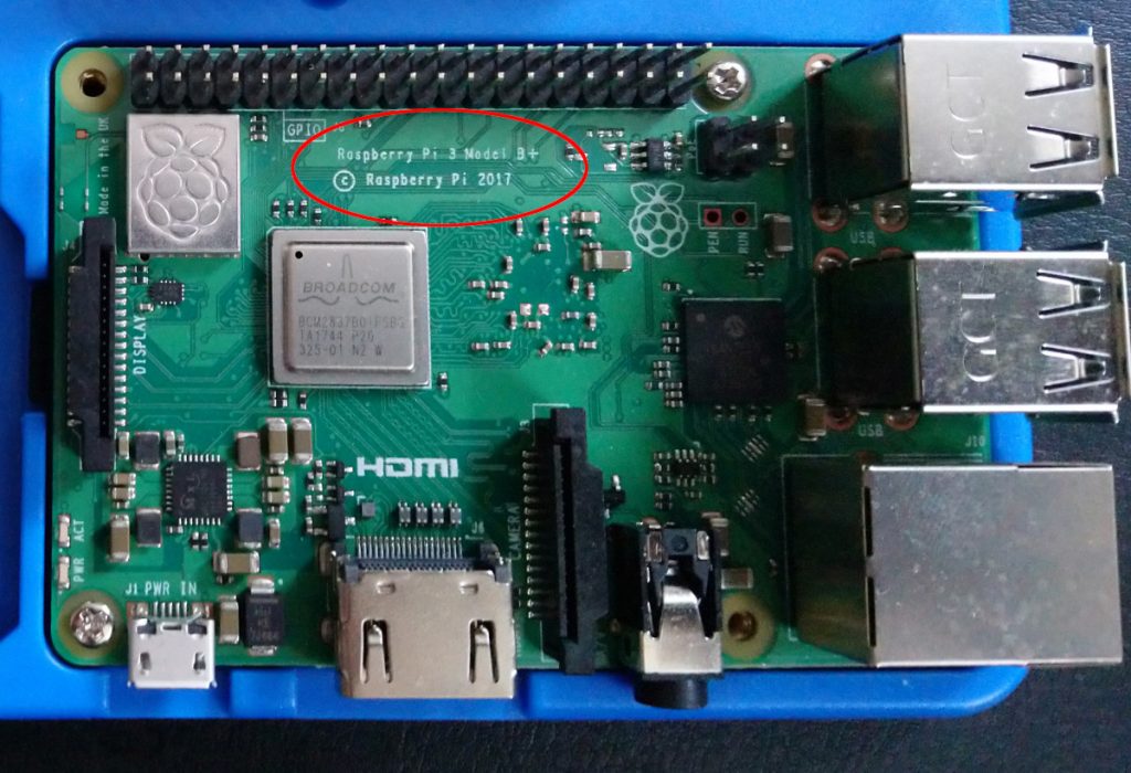 The Raspberry Pi model and version is printed on the physical board itself.