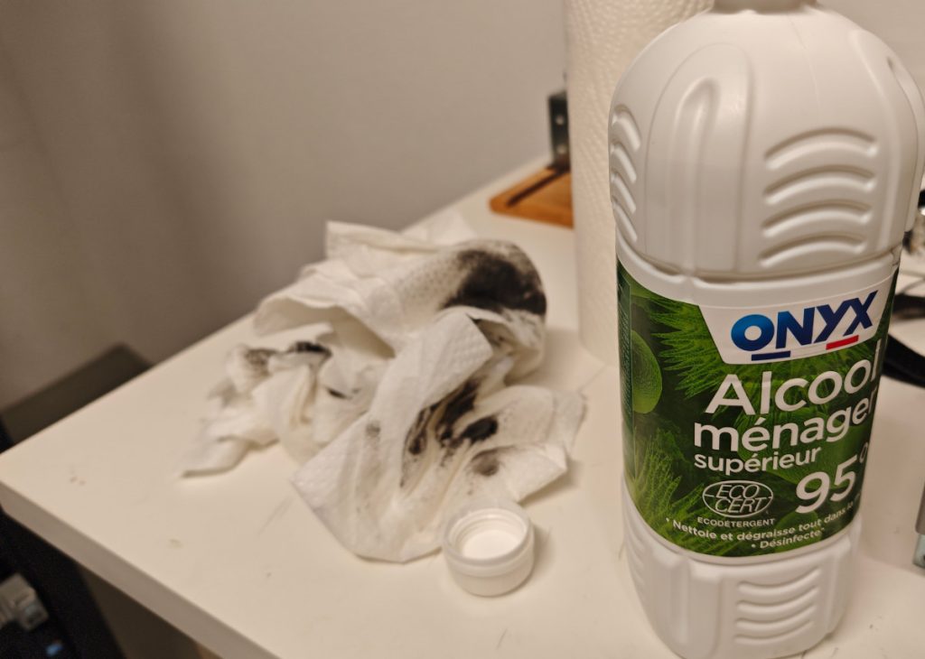 The soft touch surface could be removed with a high percentage alcohol cleaner.